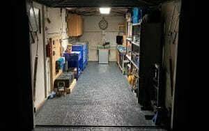 Reclaimed garage conversion interior by Adam C