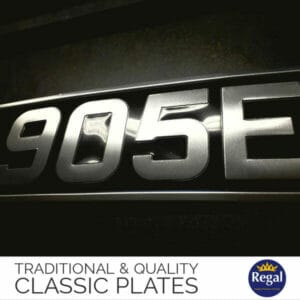 black and silver classic car plates