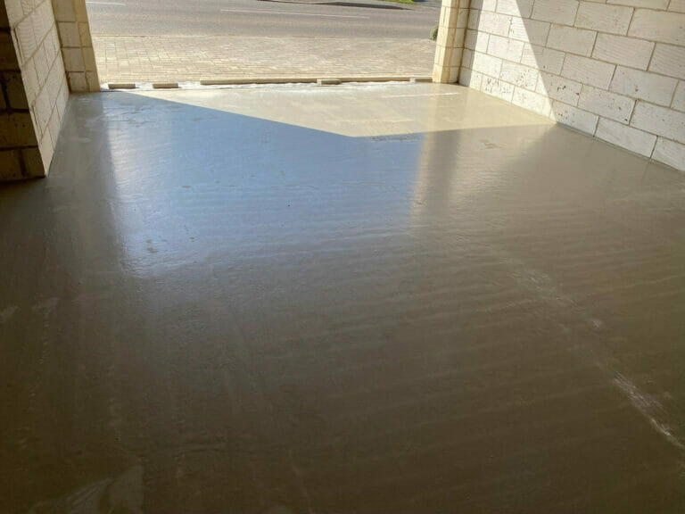 In late Spring we poured 50mm deep self leveling concrete over the top of a 100mm concrete floor.