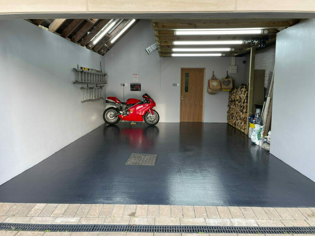 The floor has now been down for 3 months and the garage section of the project is complete, we couldn’t be happier with it. Every friend and passerby has commented on the floor and the overall positive look it bring to the finished project.