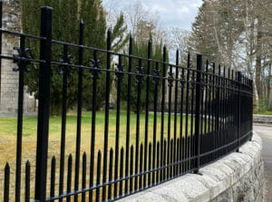Decorative gloss - One coat black enamel to freshen up the Gates and railings at Balmoral Castle for the Queen's jubilee.