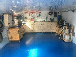Ford Tractor Blue two pack epoxy floor paint top coat applied to a garage floor