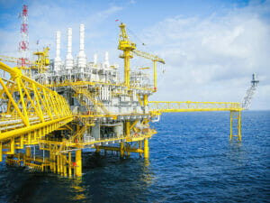 One Coat High Build Steel Enamel - Oil and gas platform in ocean at gulf of Thailand, cloud, blue sky