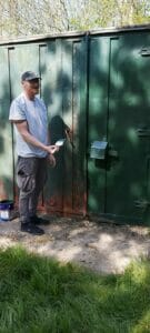 Painting skip with Brunswick Green container paint