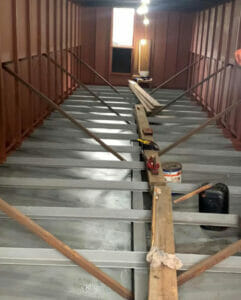 Barge paint - narrowboat painted in red oxide